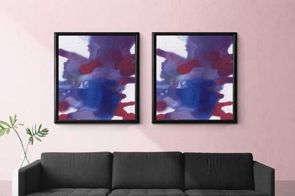 Brown Sofa Against Pink Wall With Plant On Left And 2 Frames Abstract Artwork