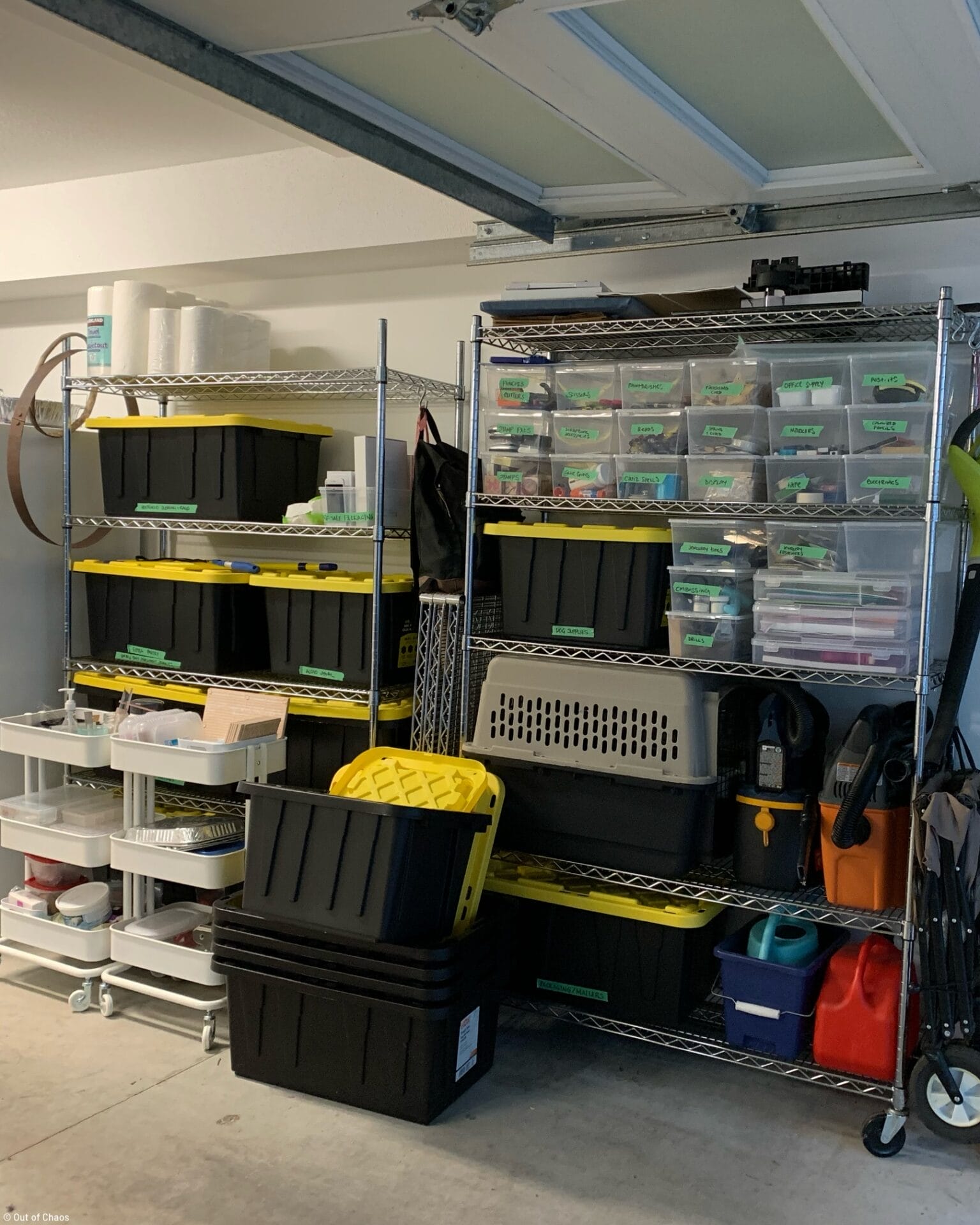 stainless steel shelves holding labelled and neatly stacked transparent bins